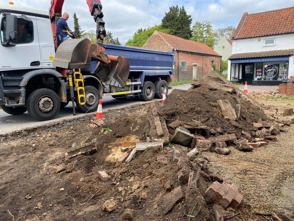 This is a photo of a dig out being carried out for the installation of a new tarmac driveway. Works being carried out by Mundford Driveways