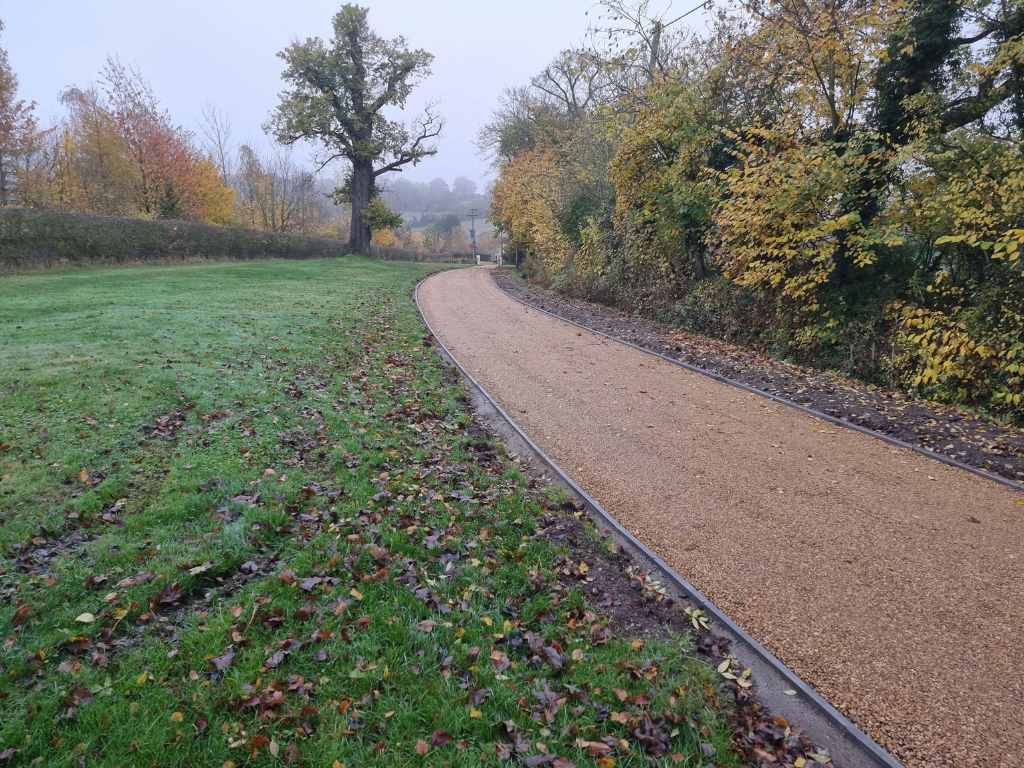 This is a large driveway which has just had a tar and chip driveway installed on by Mundford Driveways