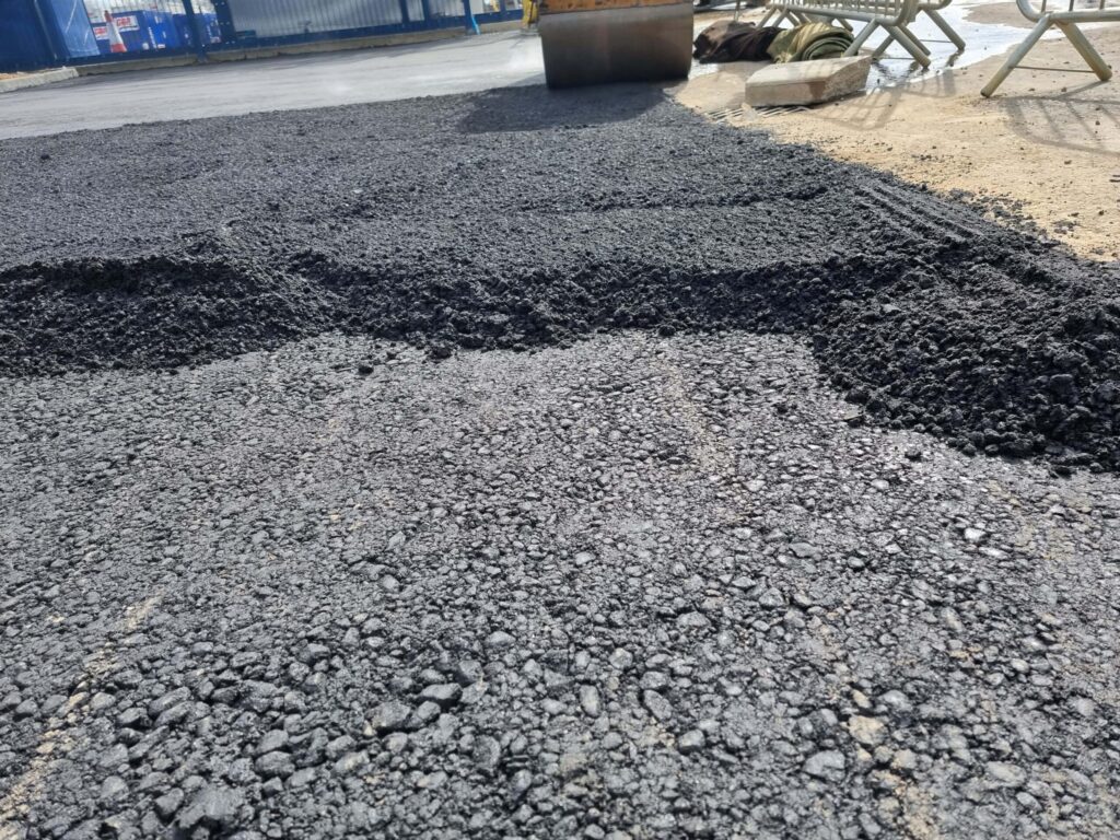 This is tarmac being laid by Mundford Driveways